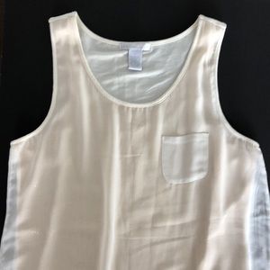 Light beige tank with sequin and sheer overlay.